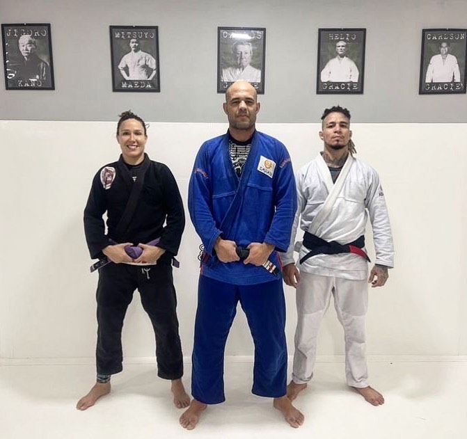 Colares on the right alongside some BJJ teammates